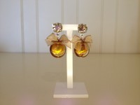 swarovski met goudkleurige kraal en strik